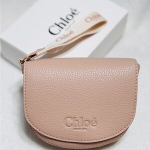 Chloe’ wristlet in blush pink leather.